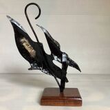 Small metal and wood fish statue