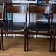 4 chaises à repas en palissandre et simili cuir marron - 1960