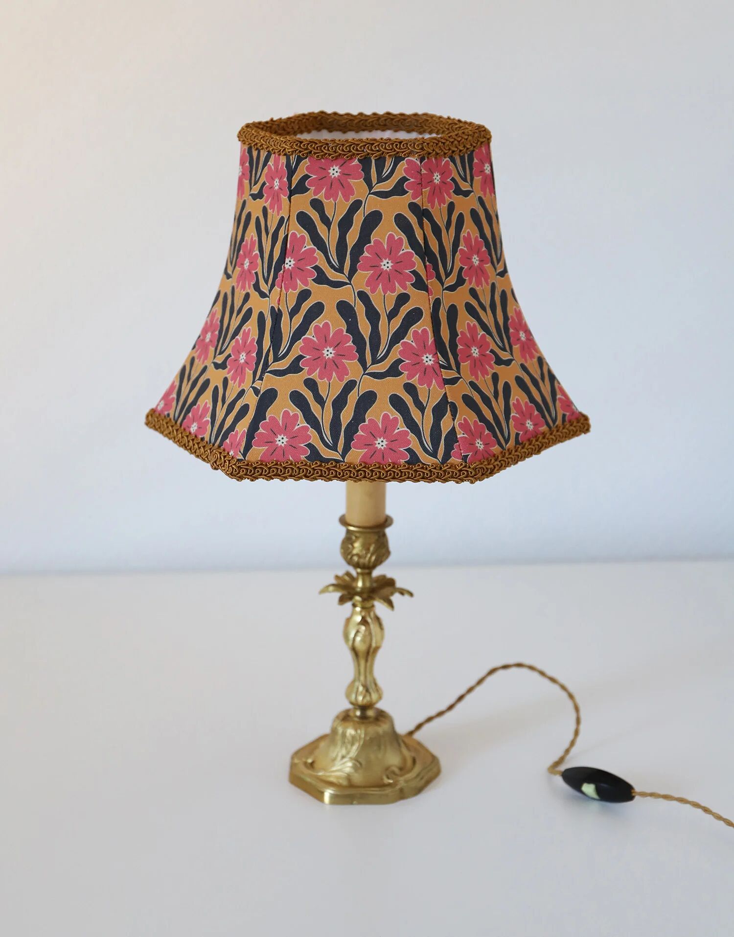 Recycled vintage lamp — antique bronze candlestick base and graphic flowers