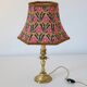 Recycled vintage lamp — antique bronze candlestick base and graphic flowers