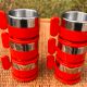 6 red cups and saucers from the Italian brand 'Morinos'.