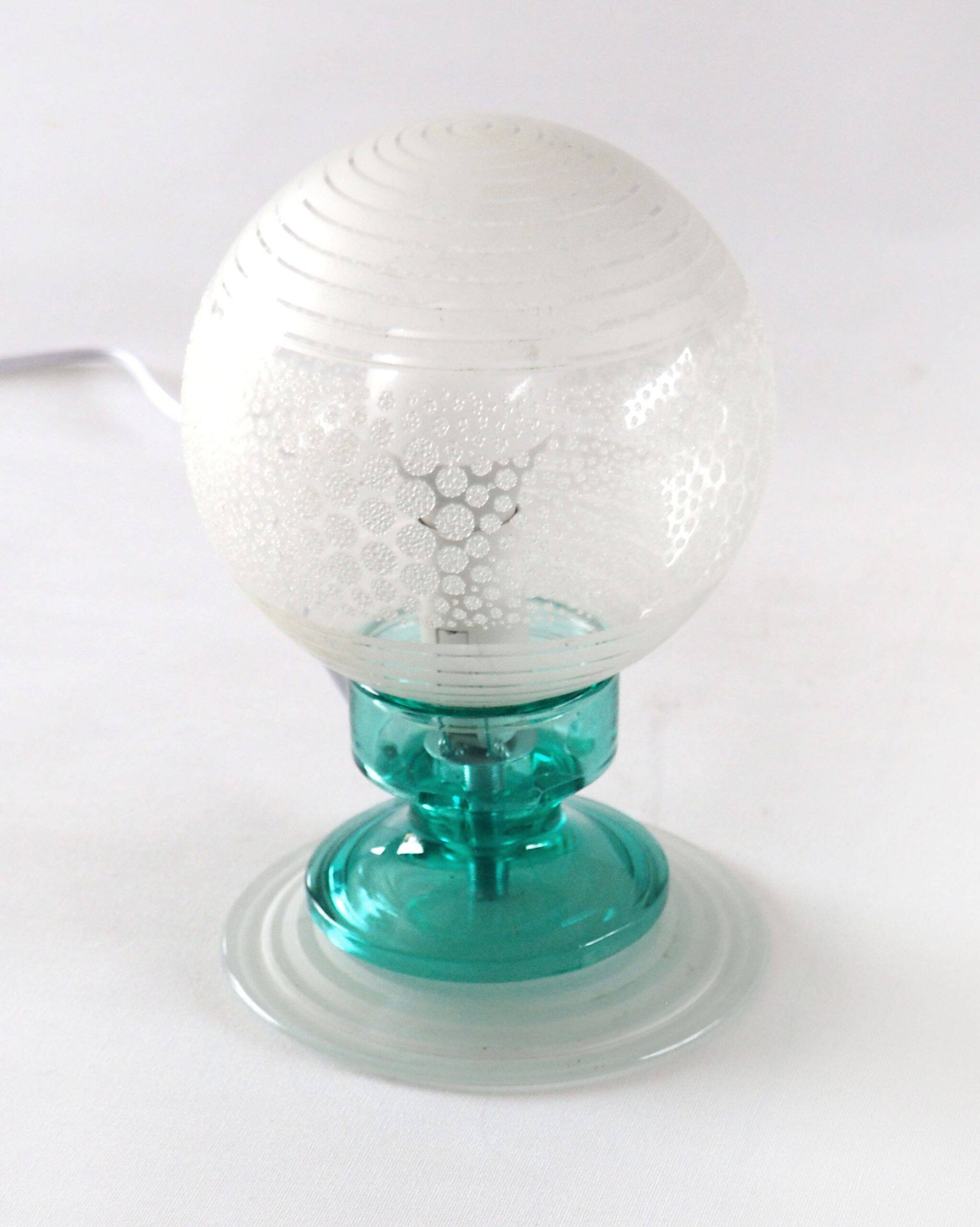 Frosted globe lamp and turquoise glass