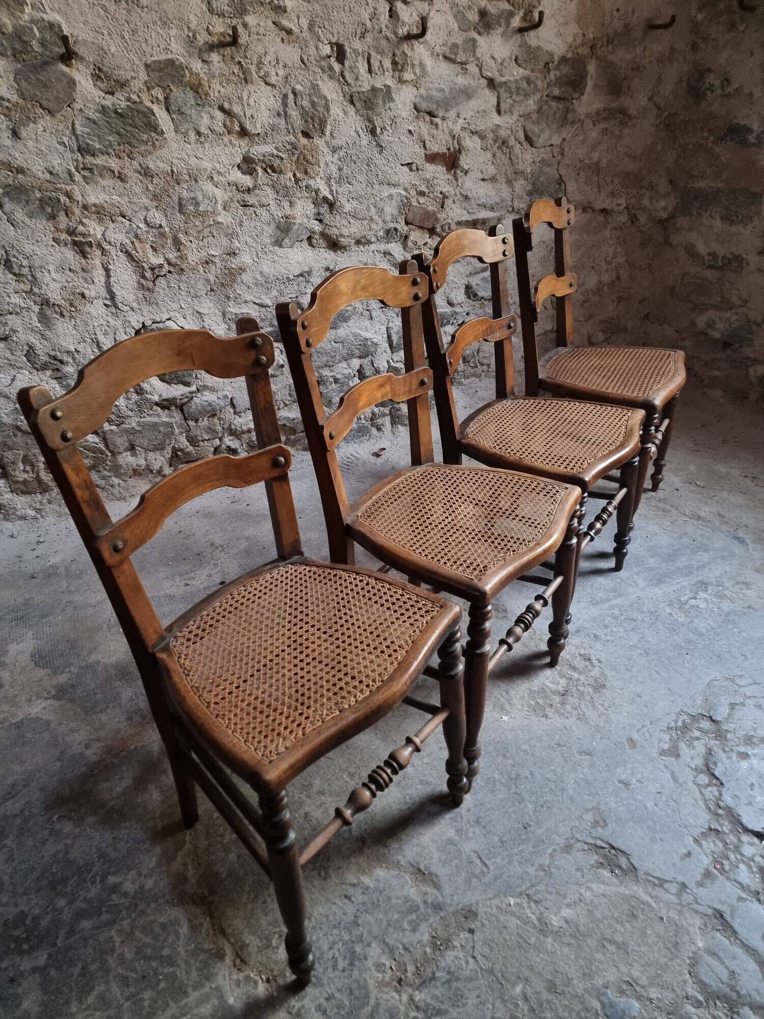 Set of 4 antique dining chairs with caned seats, beech, France, circa 1900–1920.
