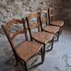 Set of 4 antique dining chairs with caned seats, beech, France, circa 1900–1920.