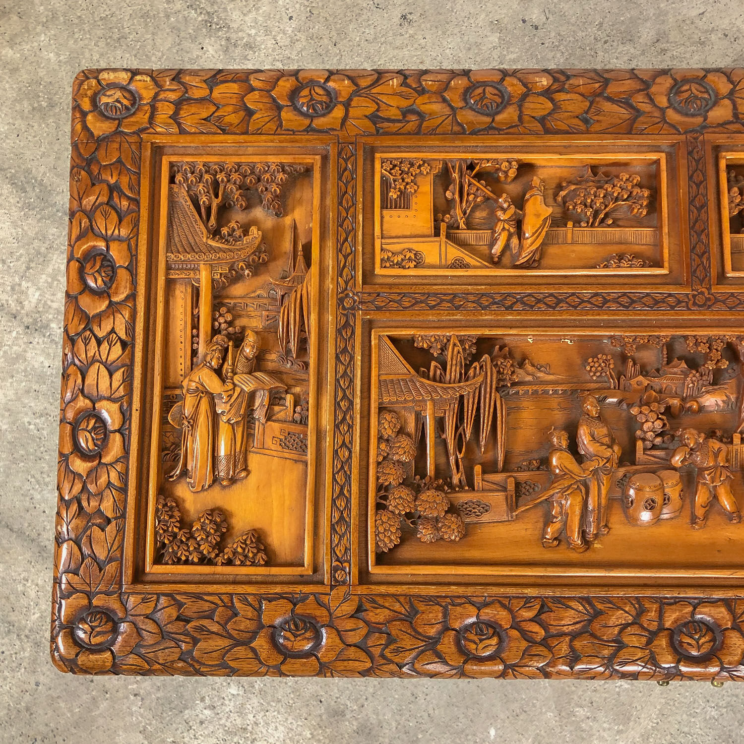 Vintage Chinese carved camphor wood chest on claw feet