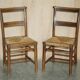 Set of six Dutch oak chairs with woven straw seats, circa 1860.