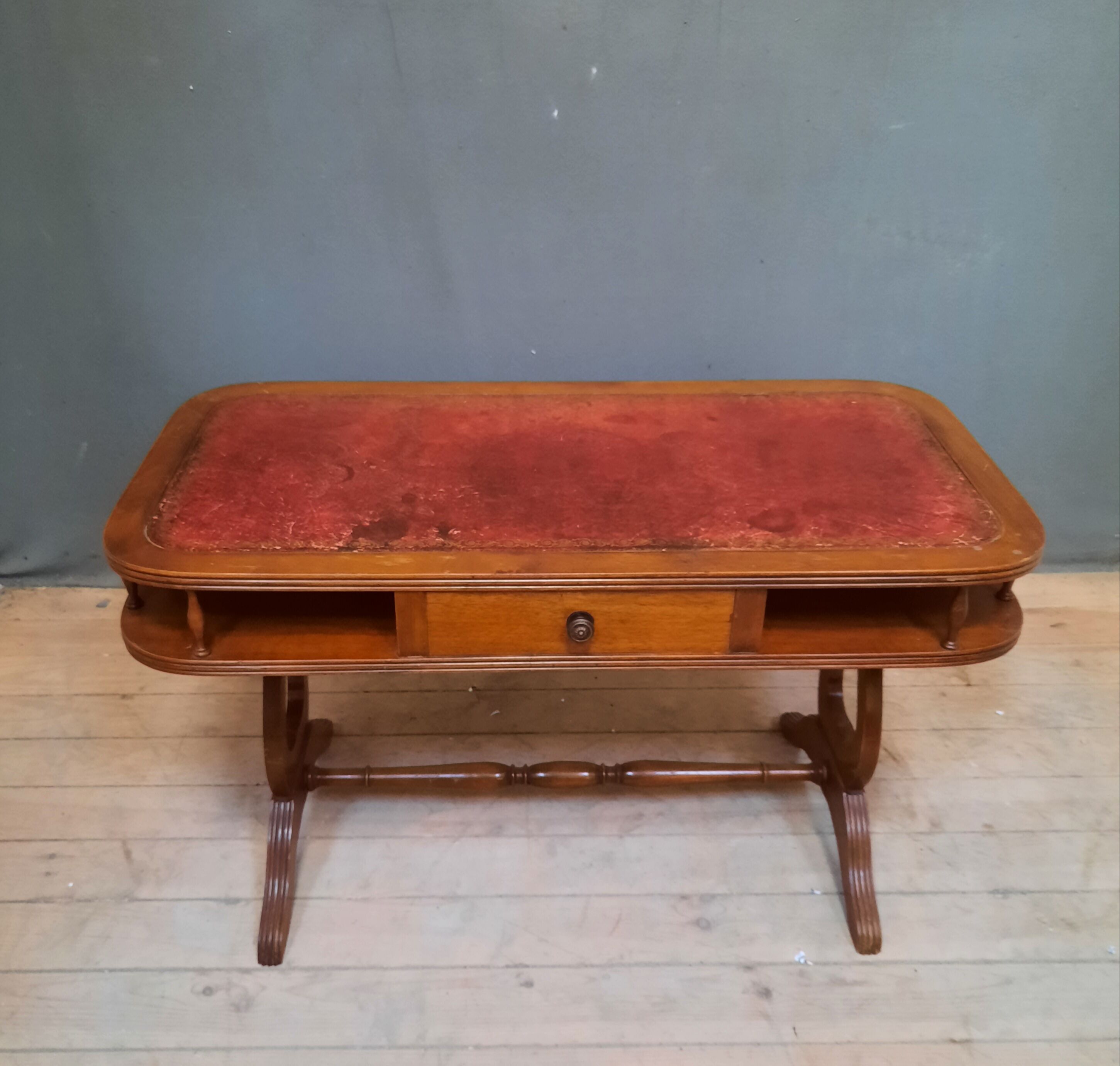 English coffee table dessu leather to a puller