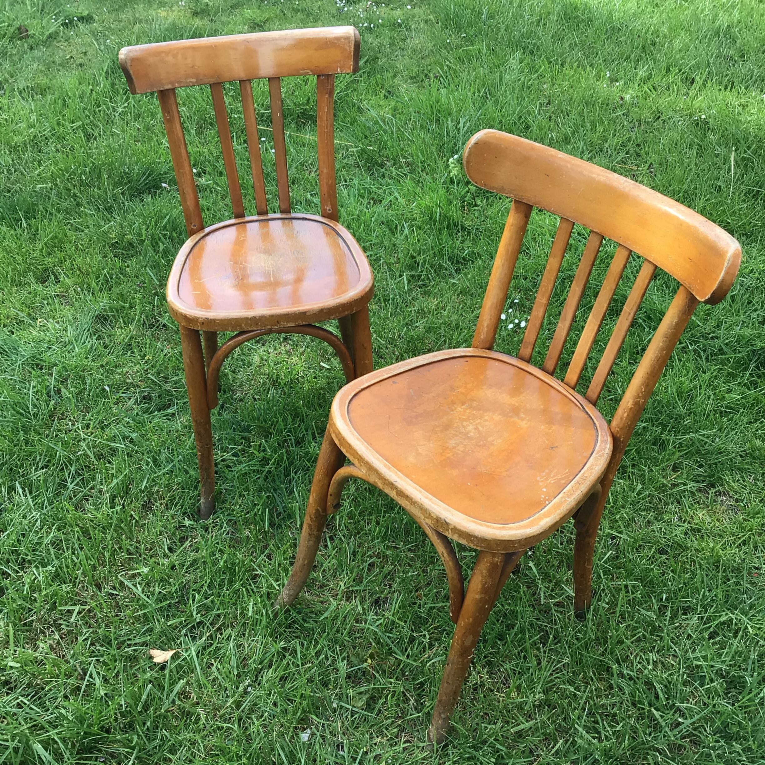 Lot of two wooden bistro chairs