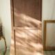 Curved display cabinet in solid walnut, mid-20th century.