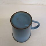 Old blue enamelled pitcher with spout