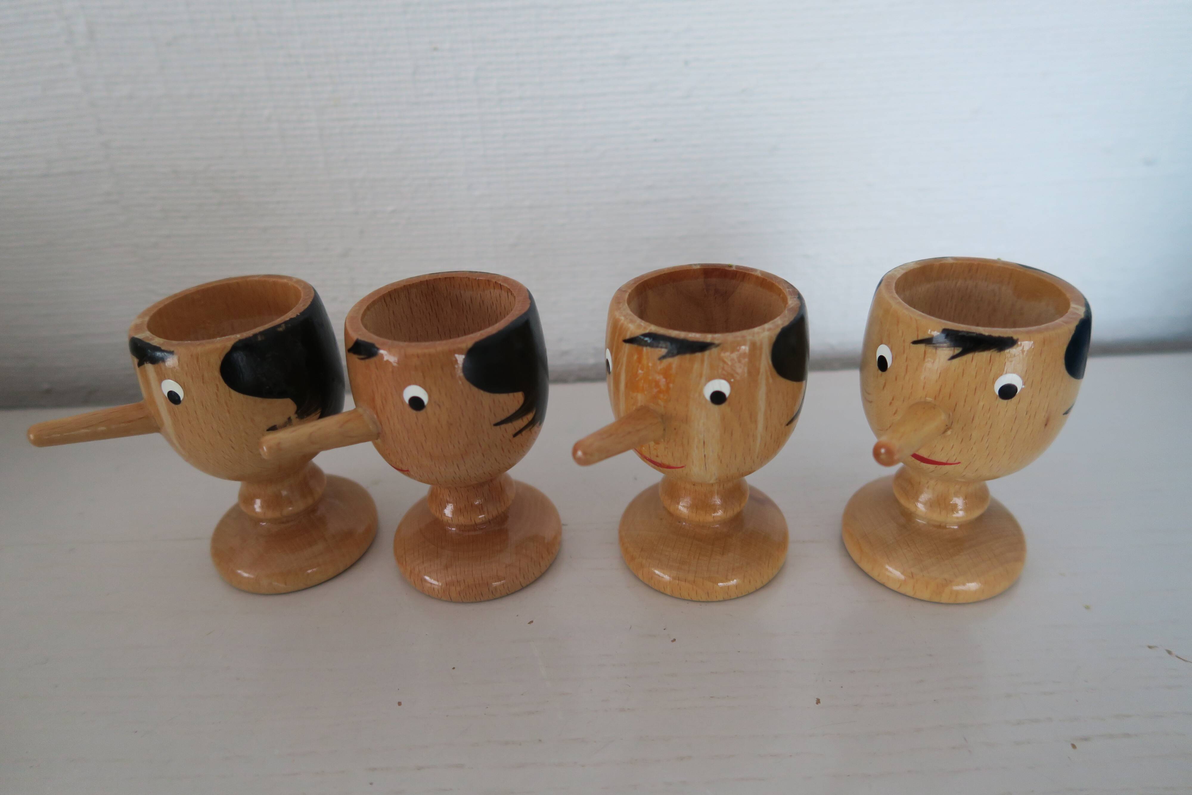 4 Pinocchio wooden egg cups Italy New