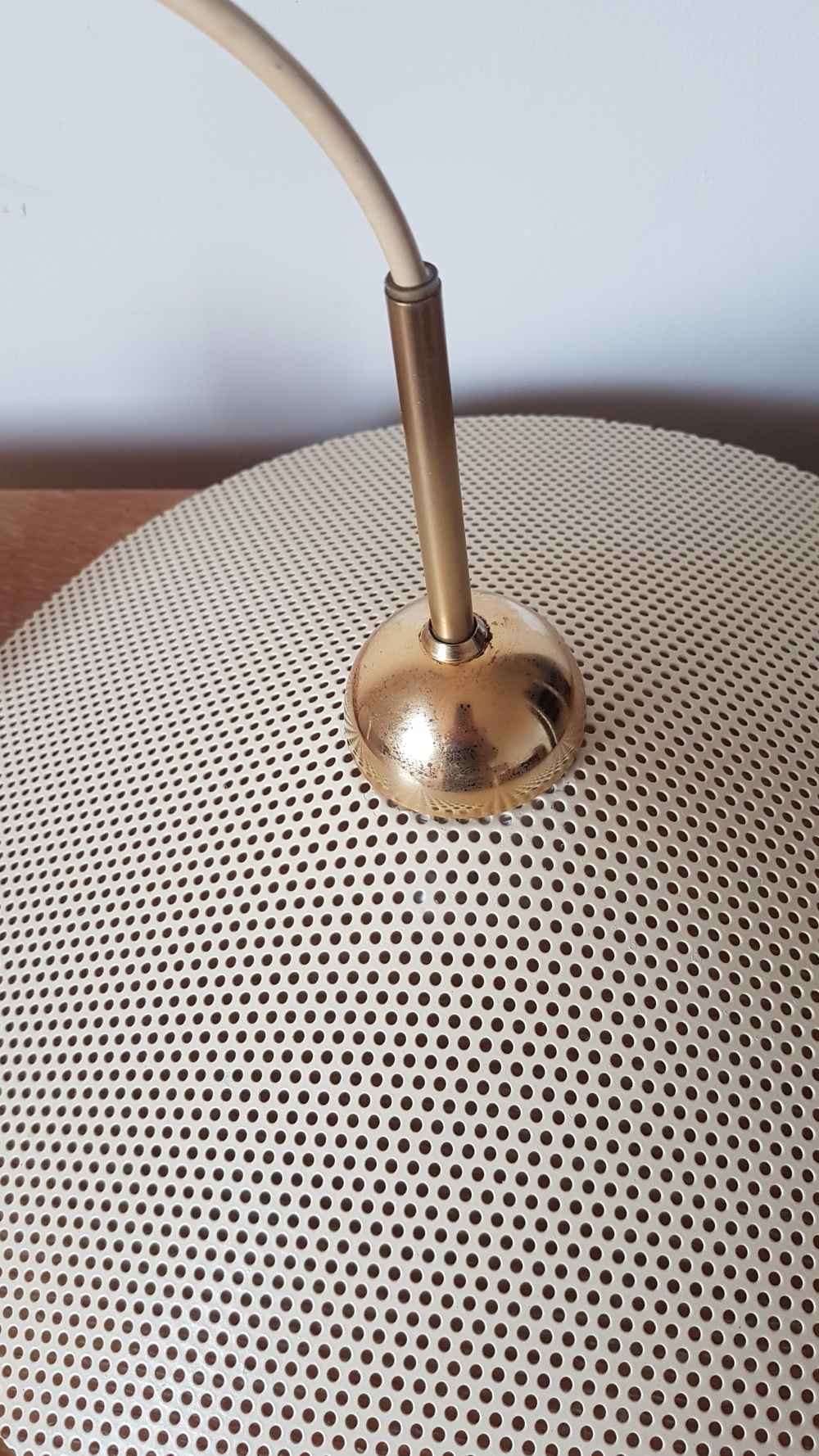 Perforated metal suspension from the 60s to 70s