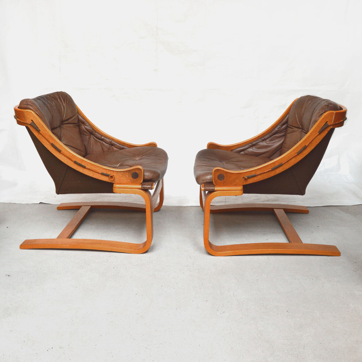 Pair of Danish armchairs in teak and leather 1970