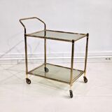 Golden metal dessert with tinted glass tops