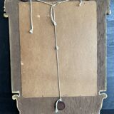 Napoleon III mirror in carved gilded wood, oval mercury glass.