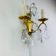 Bronze wall light with rococo style Louis XV pendants.