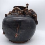 Antique Khmer ceramic vase. With elephant decoration.