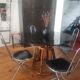 Rattan dining table and smoked glass