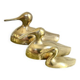 Three brass ducks from the 1950s