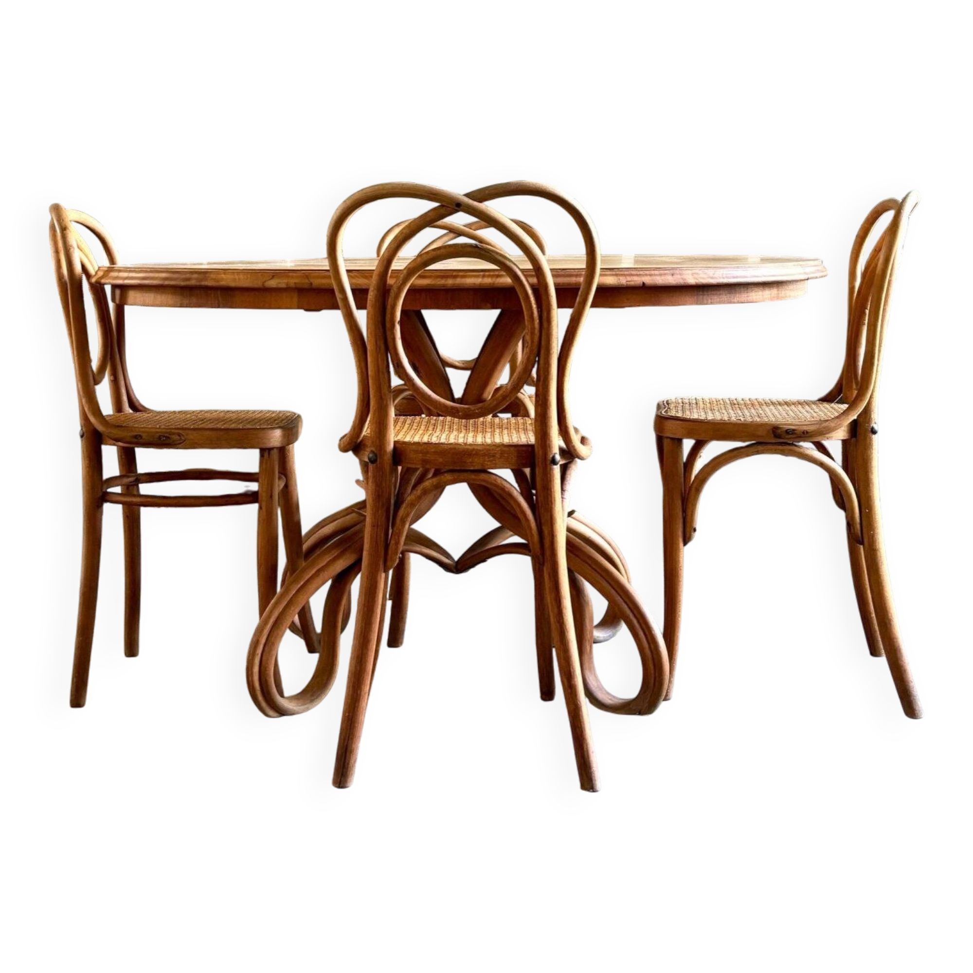 Thonet table no. 3 and 4 bent beech chairs with caning, circa 1890.