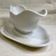 Saucière en porcelaine blanche. AH & C, France.