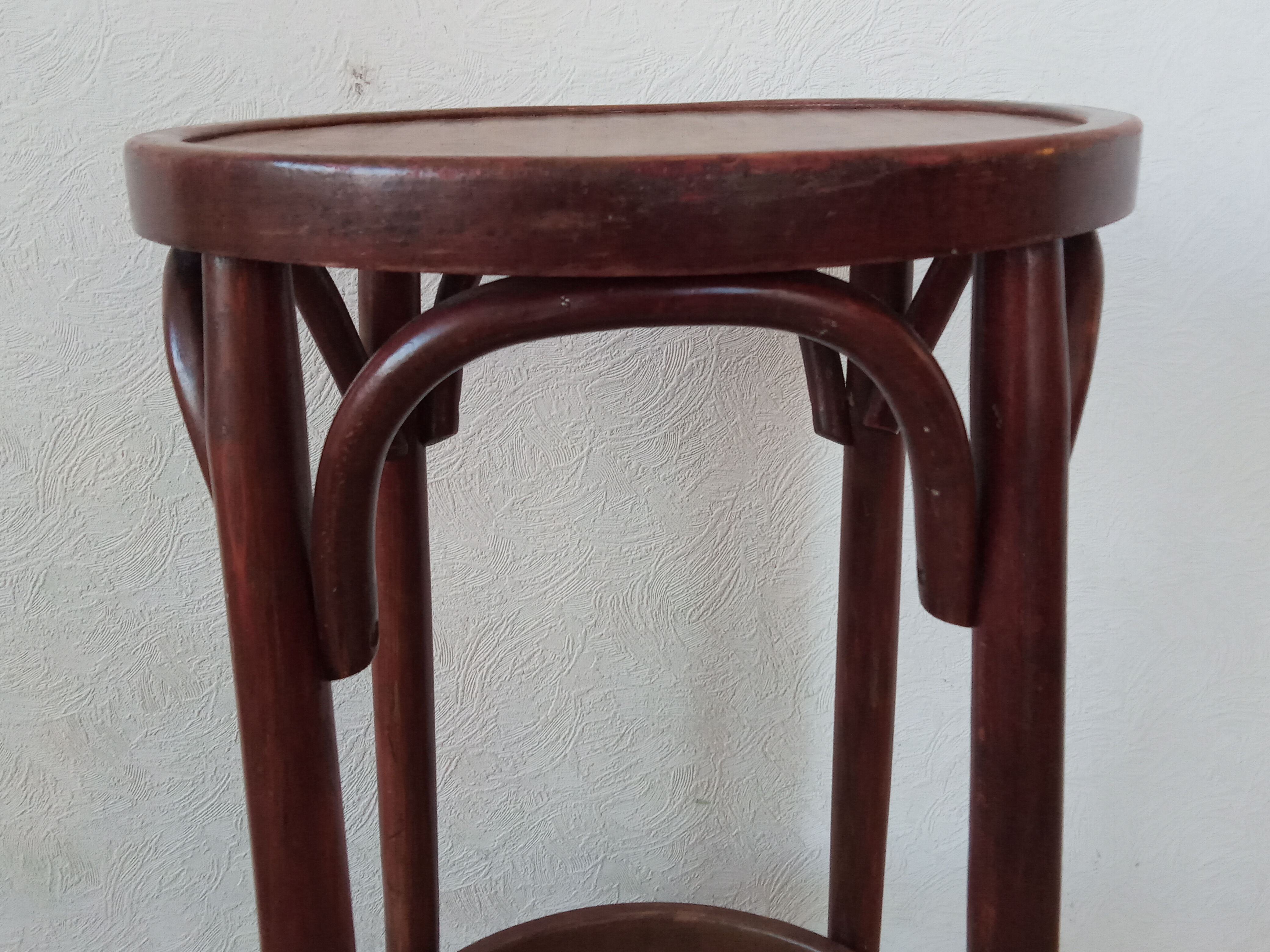 Curved wooden bar stool