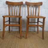pair of vintage wooden bistro chairs
