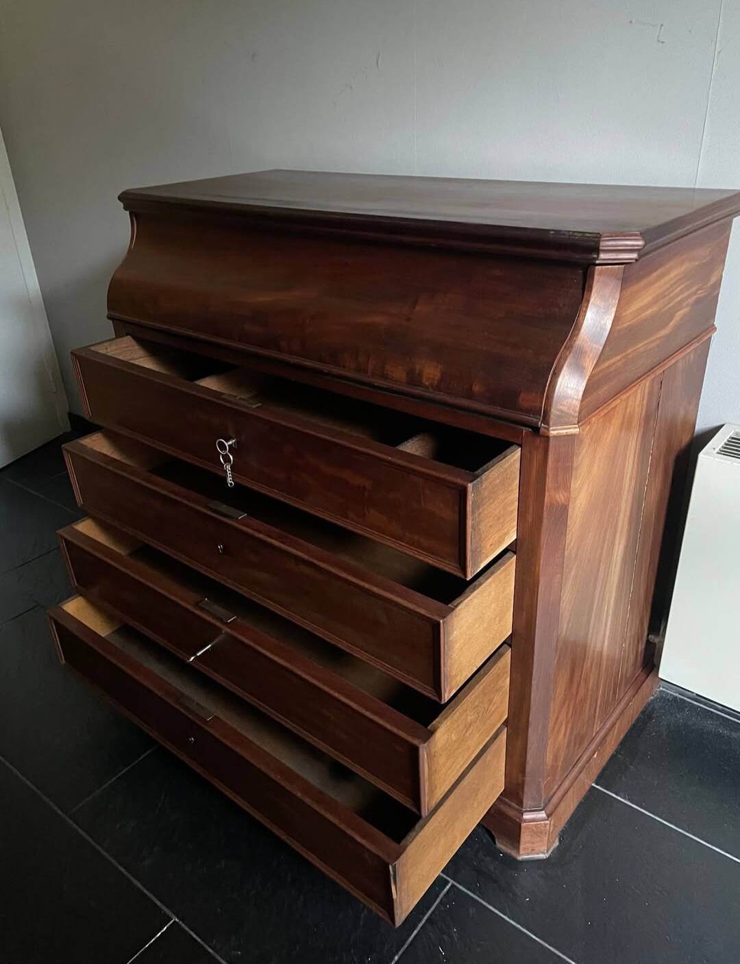 Vintage wooden toilet commode with marble top.