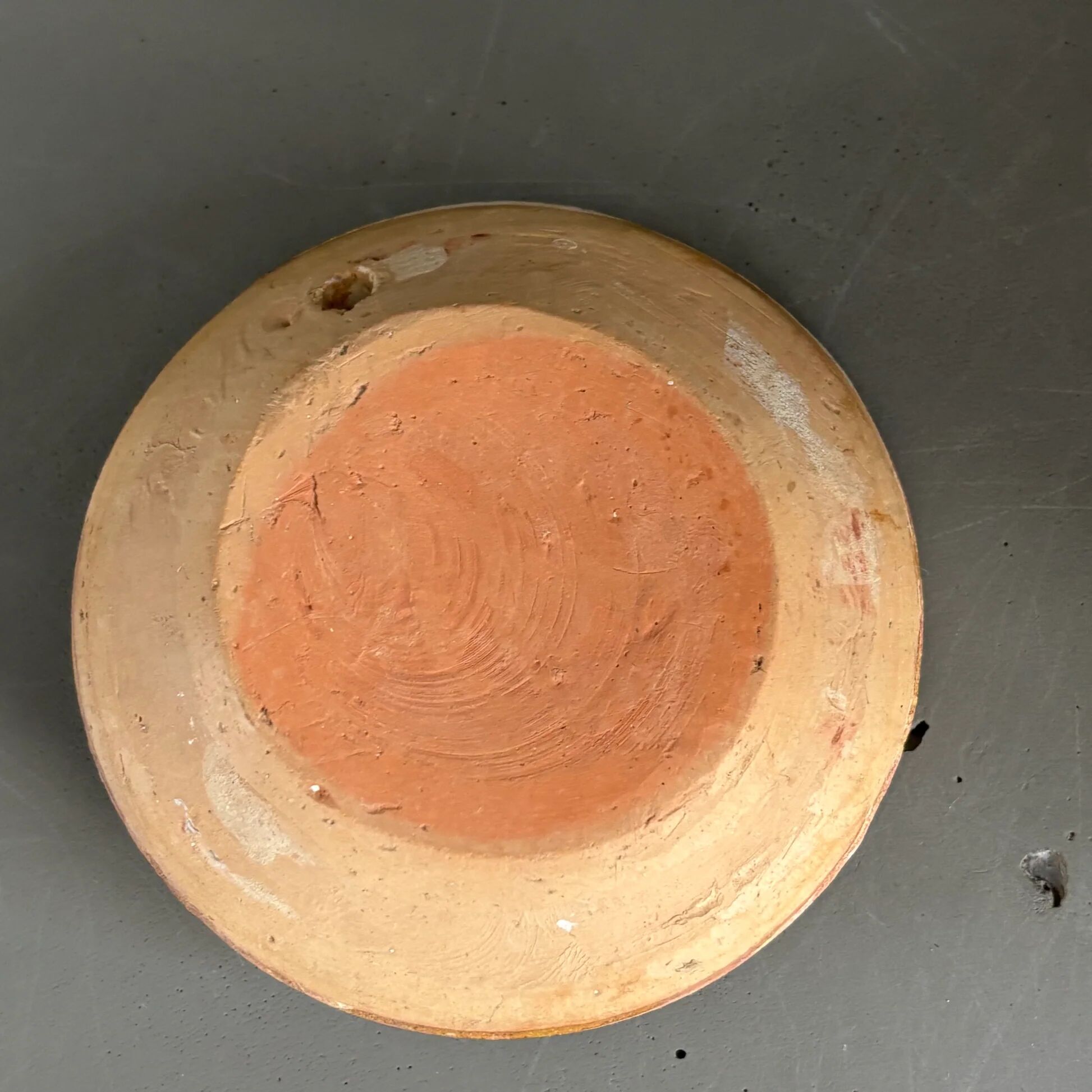 Ancient oil jar in glazed terracotta