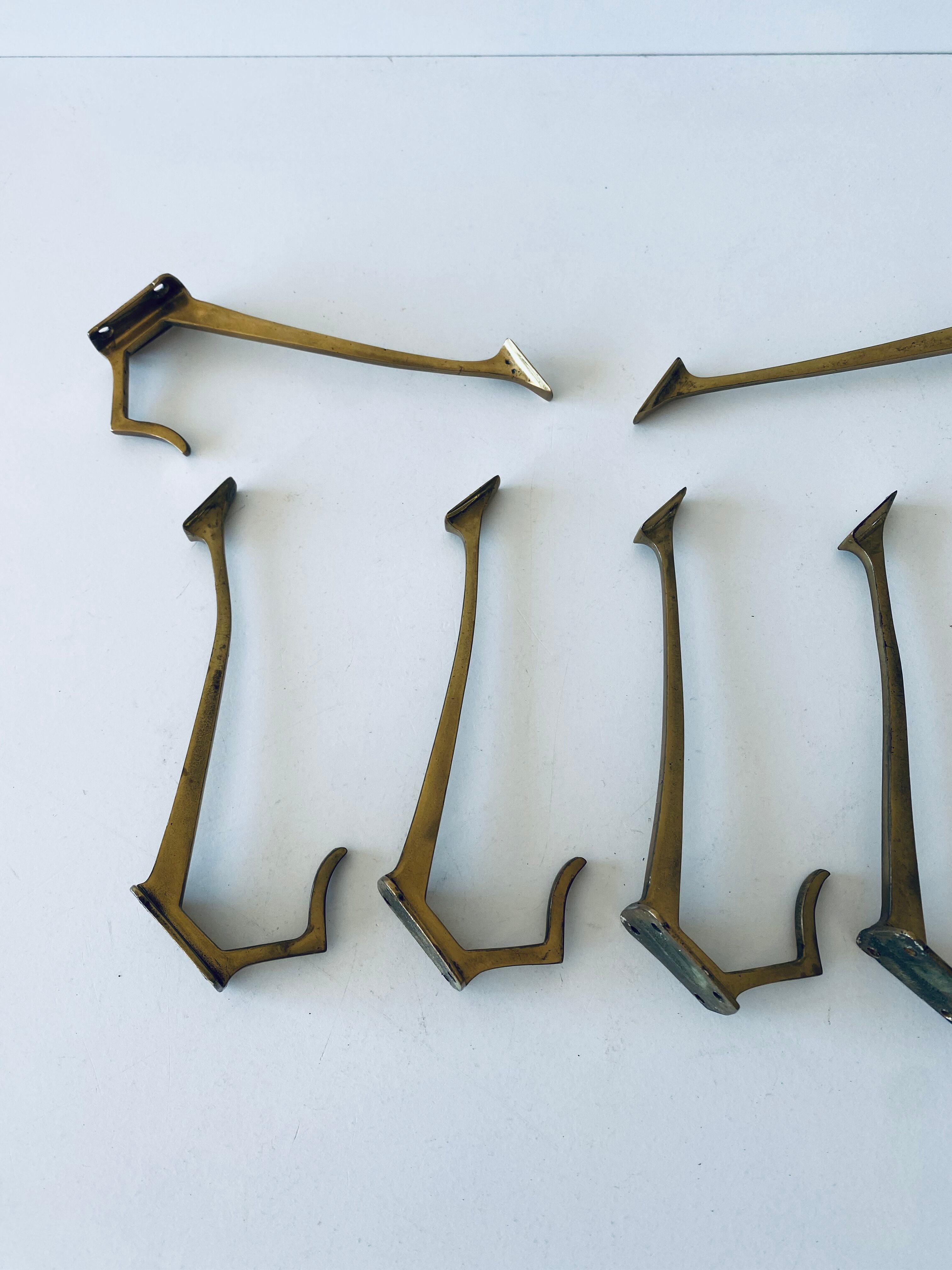 Pair of vintage brass hooks