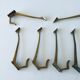 Pair of vintage brass hooks