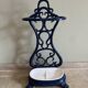 Enamelled cast iron umbrella stand from the early 20th century.