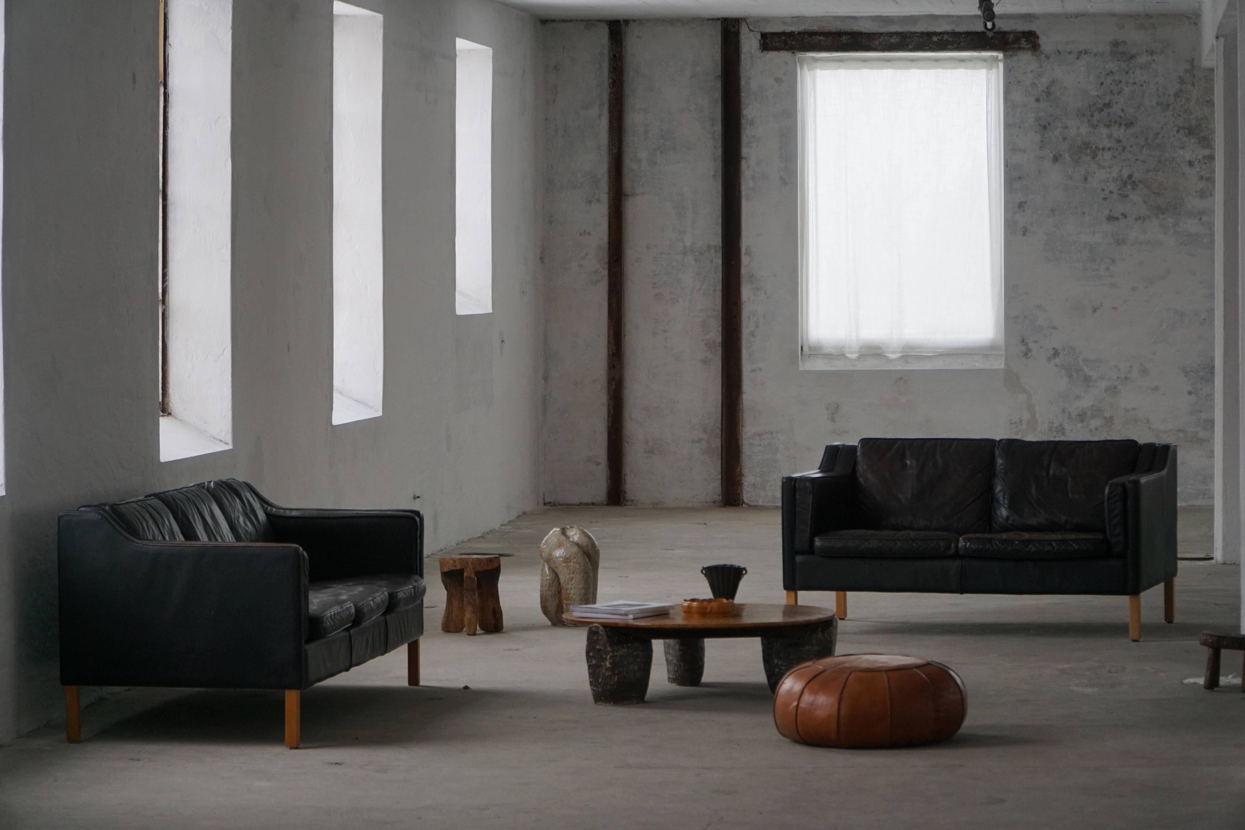 Mogens Hansen, 2-seater canapé mid-century, patinated black leather, 1970s.