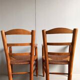 Pair of vintage armchairs in solid wood and straw – Georges Robert