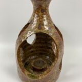 Hand-held sandstone candlestick