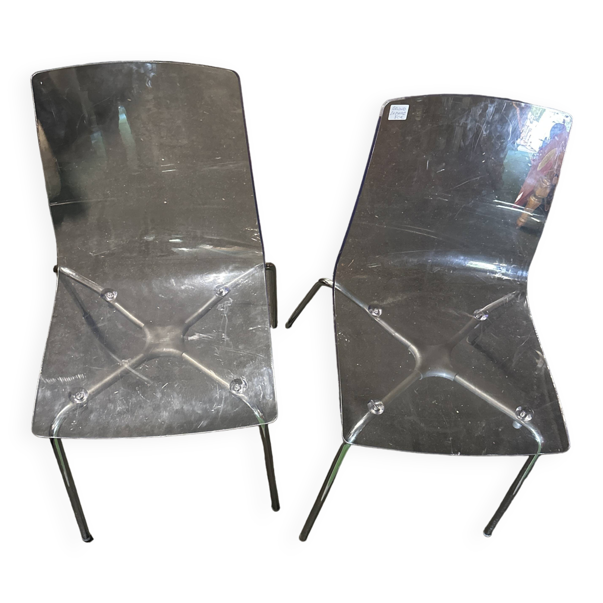Pair of smoked polycarbonate chairs