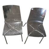 Pair of smoked polycarbonate chairs