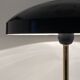 Rare black and gold UFO table lamp by Louis Kalff for Philips.