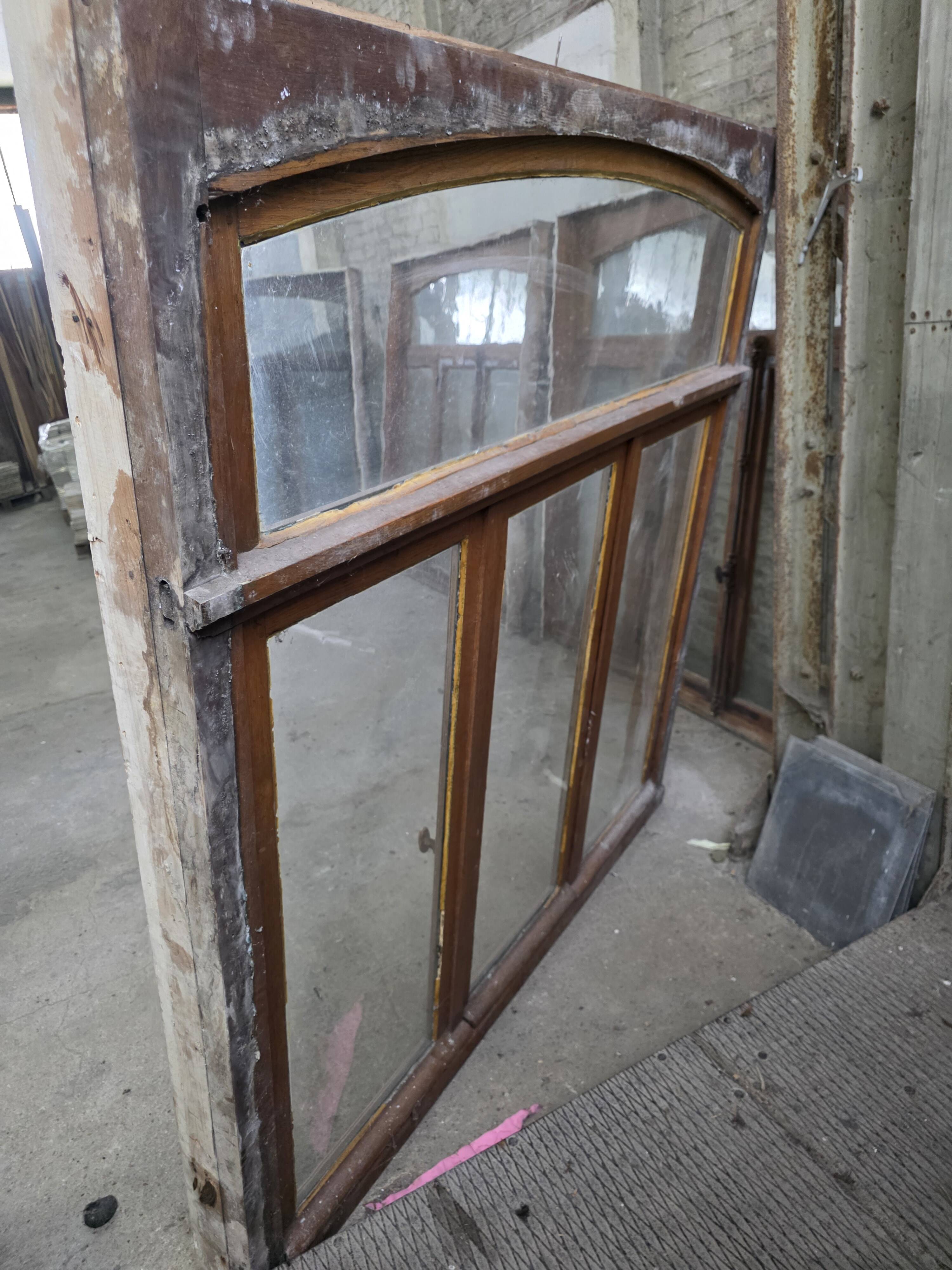 Old solid oak window from the early 20th century.