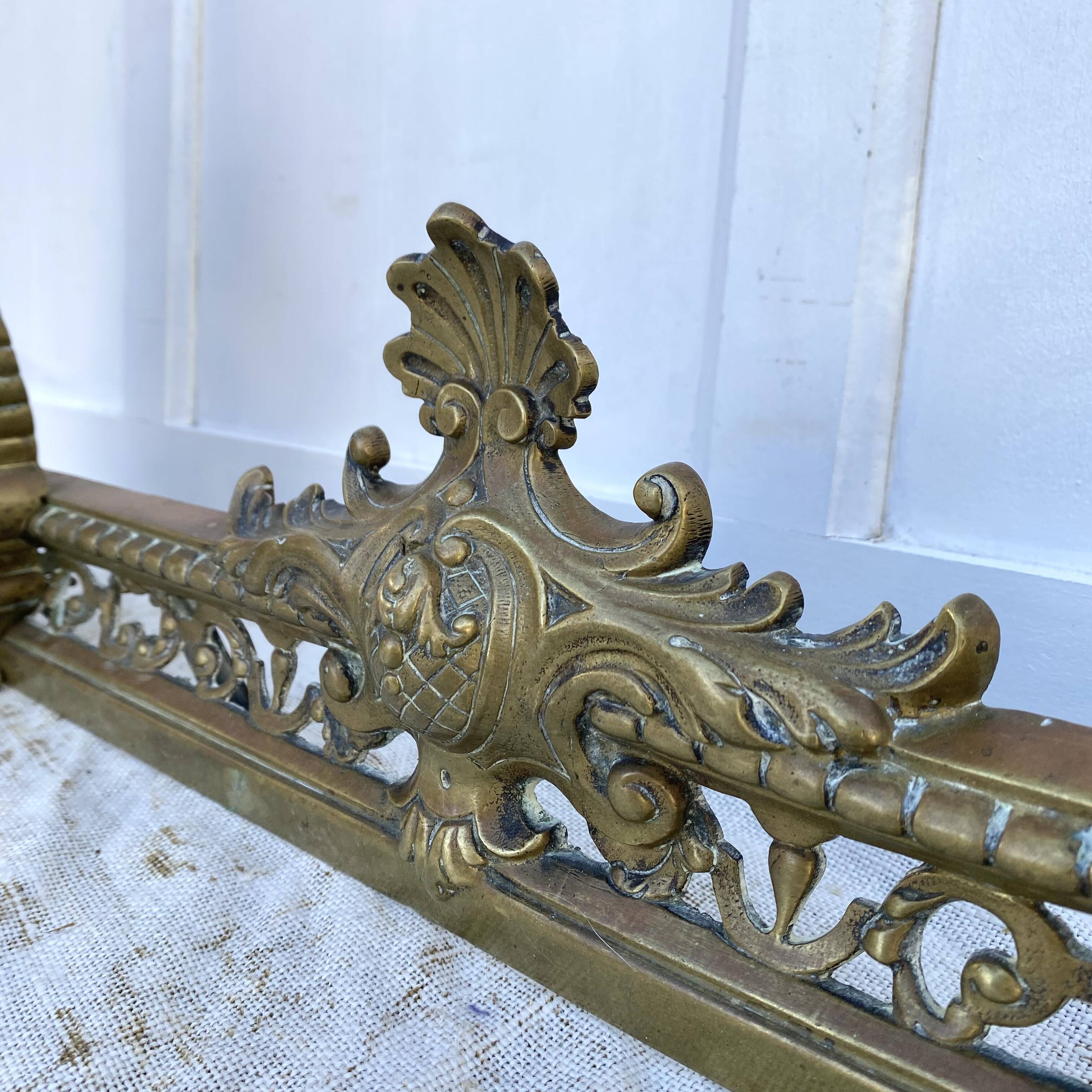 Antique brass fireplace set, bar and andirons, Napoleon I style.