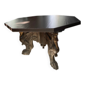 Octagonal oak table, 19th century, with griffins.
