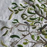 Hand-embroidered tablecloth on rectangular thread canvas