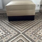 Two armchairs and an Art Deco style pouf