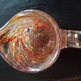 Multi-colored speckled glass pitcher