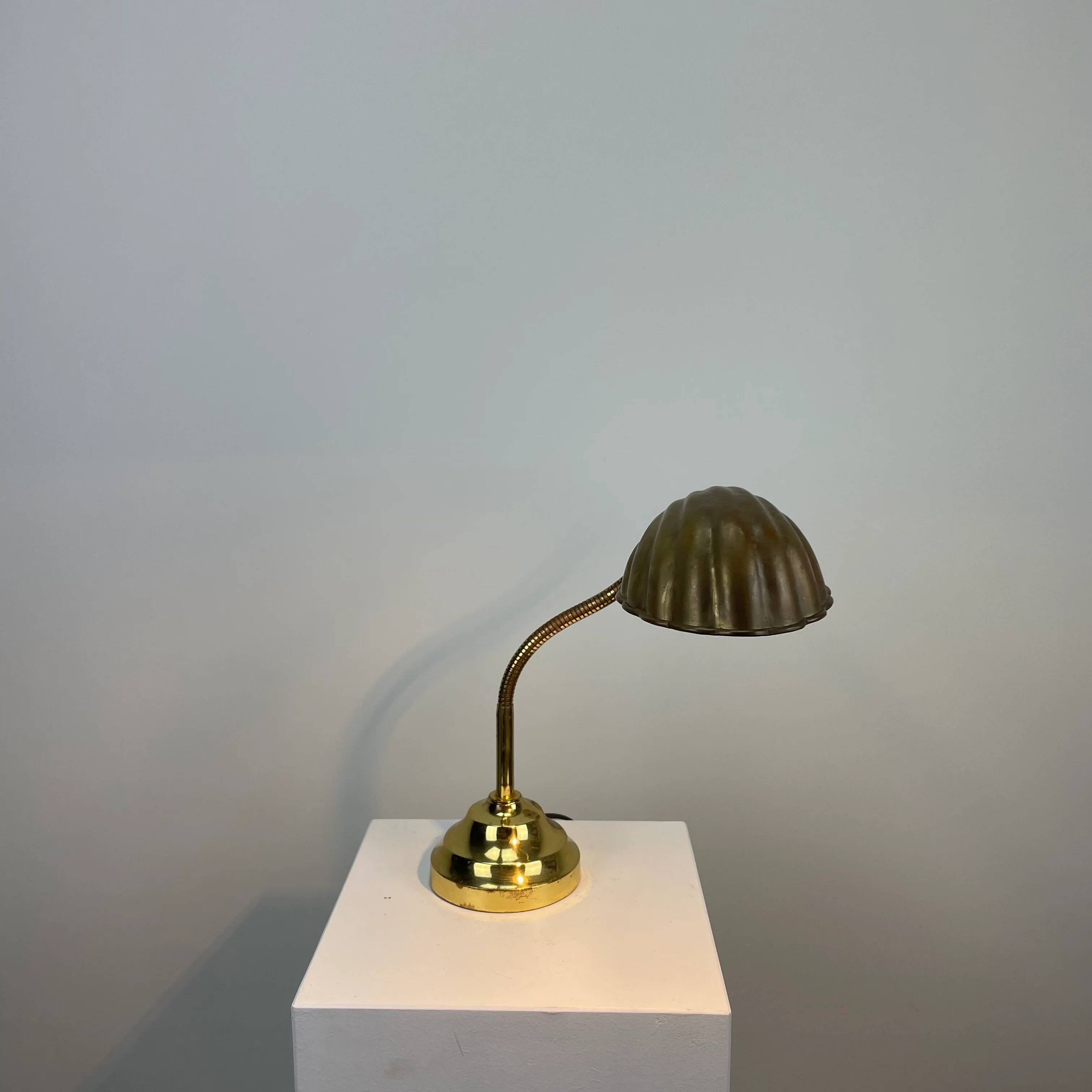 French table lamp in brass with a shell-shaped shade from the 1950s.