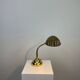 French table lamp in brass with a shell-shaped shade from the 1950s.