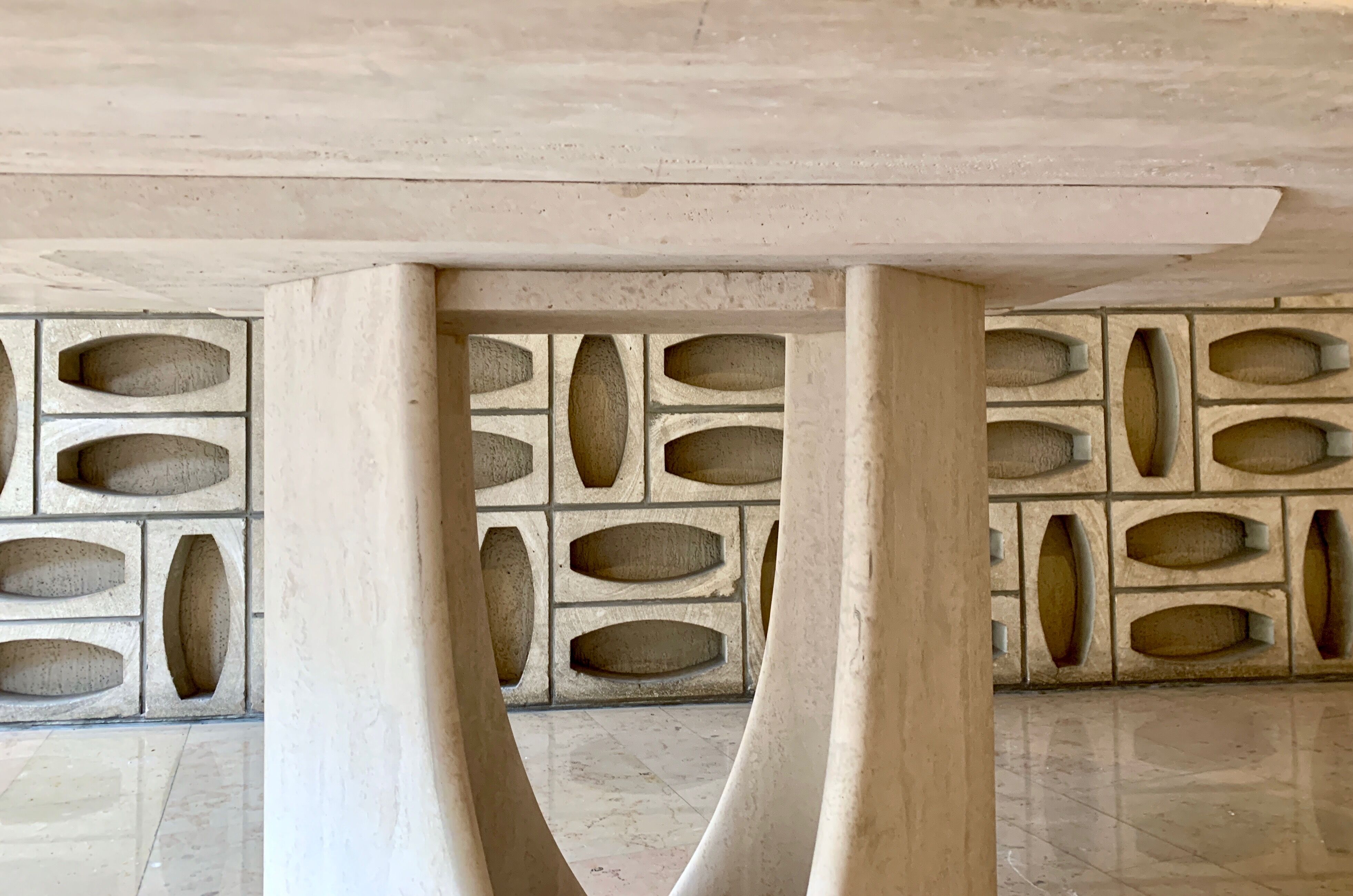 Oblong travertine dining table