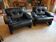 Pair of designer leather armchairs by Tobia Scarpa.