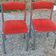 Pair of designer chairs in chrome metal and orange velvet from the 1970s.