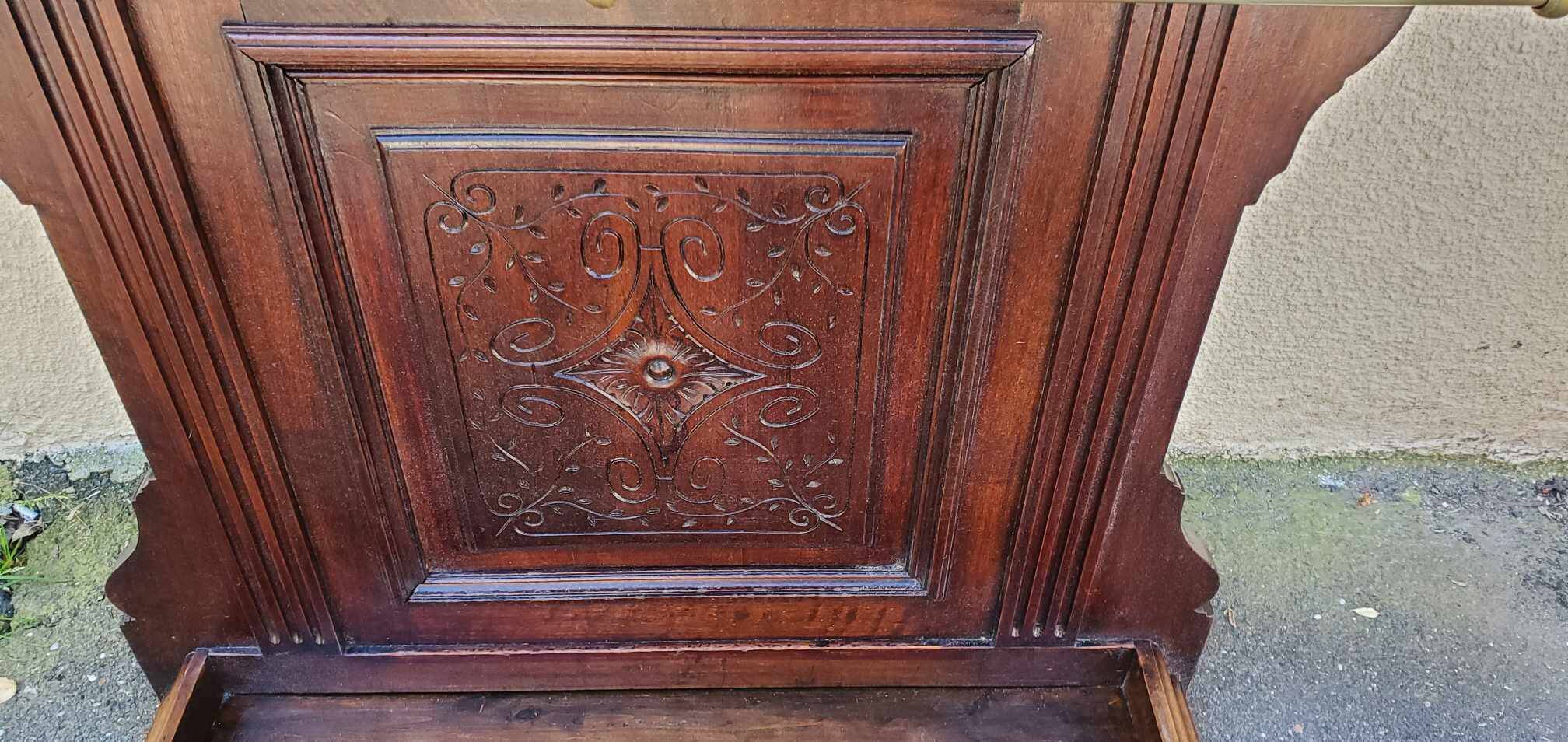 Old and beautiful wooden coat rack cloakroom early 20th century